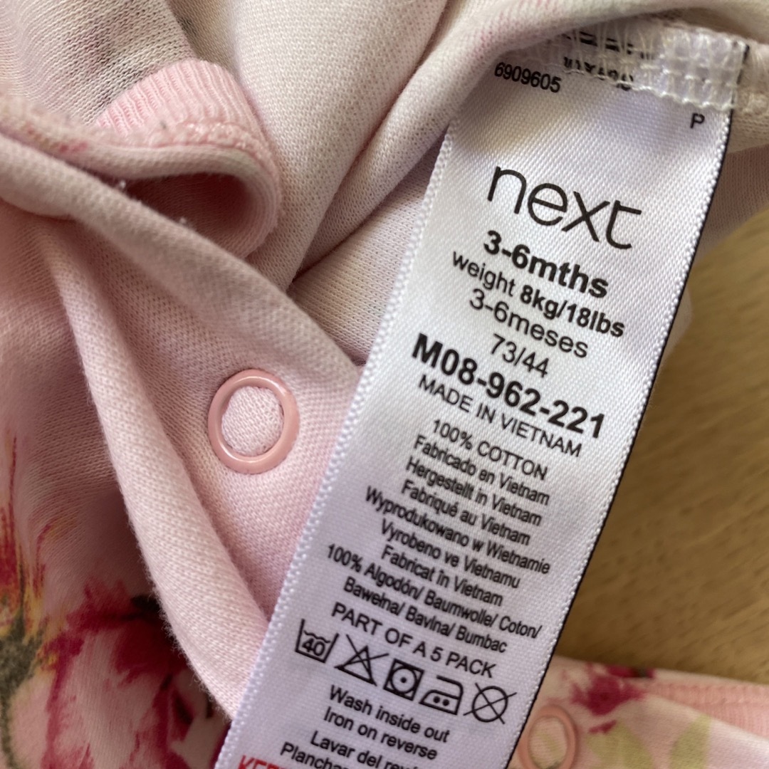NEXT(ネクスト)のnext ロンパース　60 ピンク　花柄 キッズ/ベビー/マタニティのベビー服(~85cm)(ロンパース)の商品写真