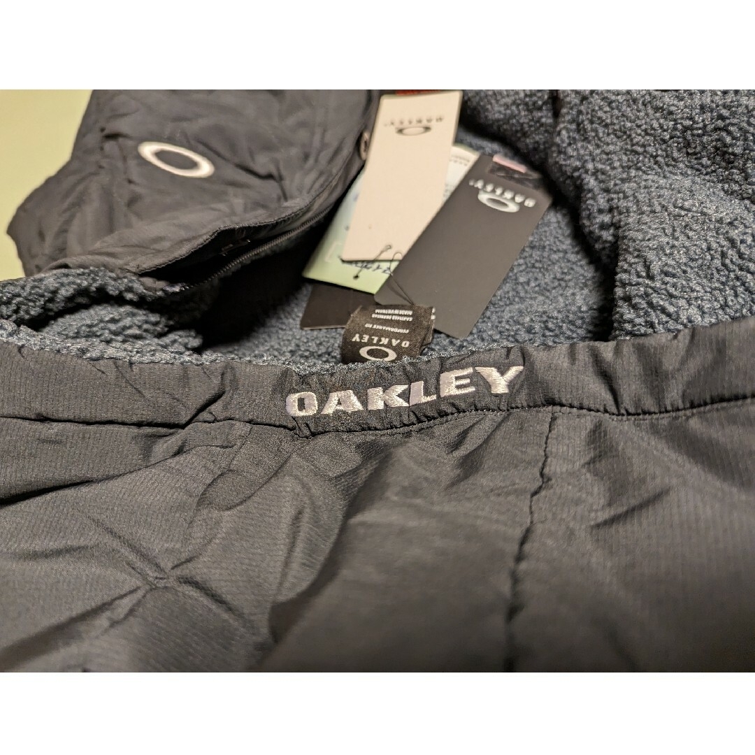 Oakley(オークリー)の【新品未使用＆超特価❗】オークリーゴルフ2WAY 中綿ジャケットBlack L メンズのジャケット/アウター(その他)の商品写真