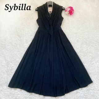 シビラ(Sybilla)の【美品】Sybilla  ボウタイ　ロングワンピース　ブラック　Aライン　フレア(ロングワンピース/マキシワンピース)