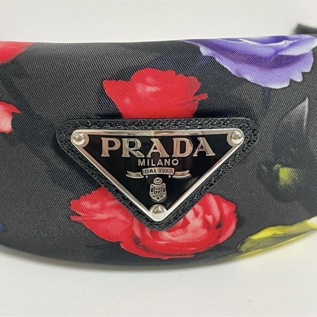 PRADA(プラダ)のPRADA プラダ 花柄 トライアングル ロゴ カチューシャ 超美品 ブラック レディースのヘアアクセサリー(カチューシャ)の商品写真