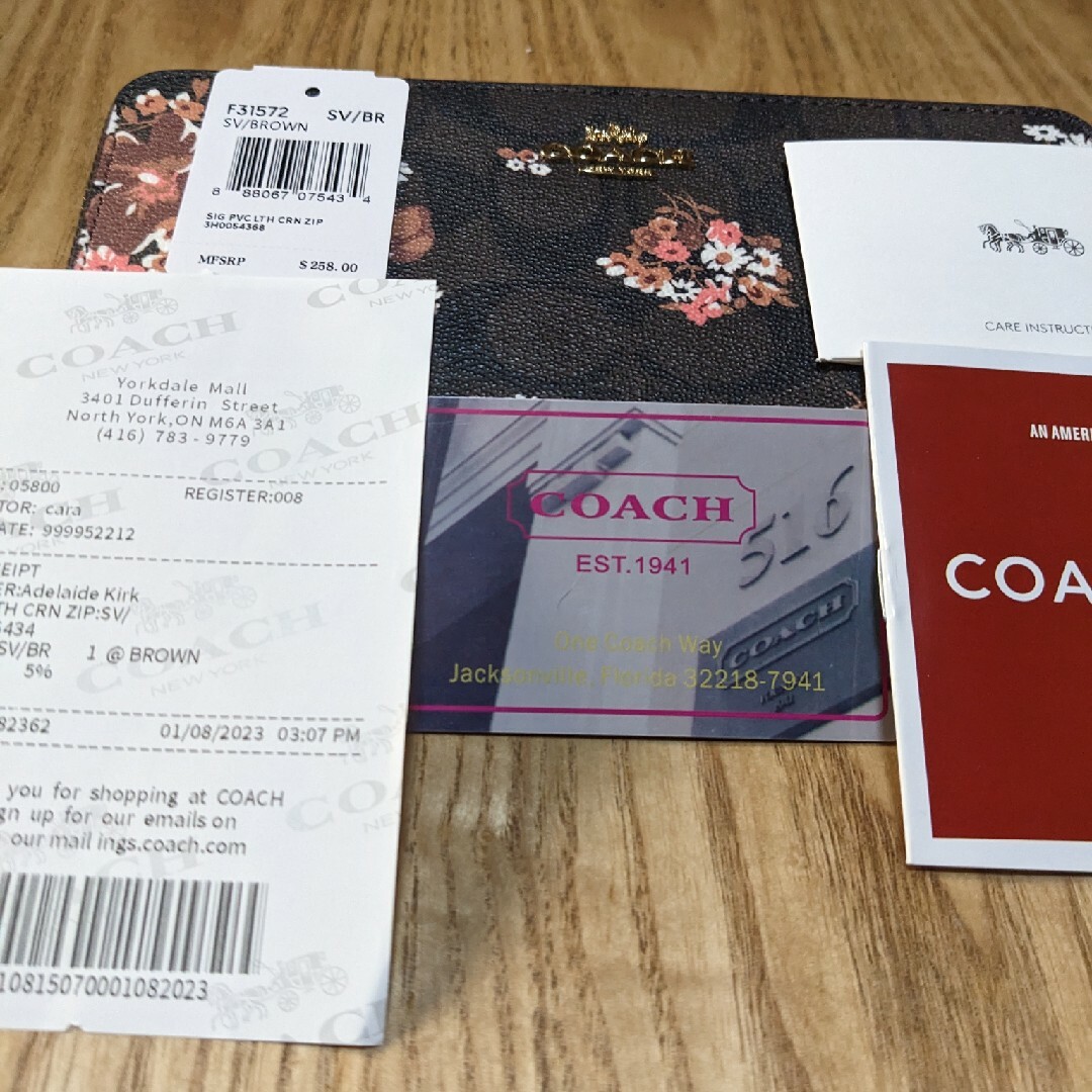 COACH(コーチ)のCOACH  長財布　黒系シグネチャー花柄 レディースのファッション小物(財布)の商品写真