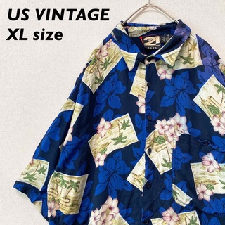 US古着　アロハシャツ　ハワイアン　半袖　総柄　花柄　ヤシの木　男女兼用　XL(シャツ)