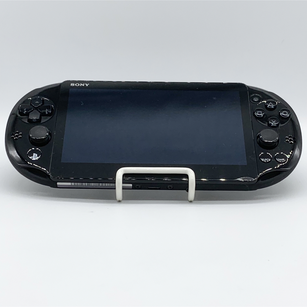 PlayStation Vita(プレイステーションヴィータ)の【完品・液晶美品】PSVita PCH-2000 ブラック 本体 動作品 エンタメ/ホビーのゲームソフト/ゲーム機本体(携帯用ゲーム機本体)の商品写真