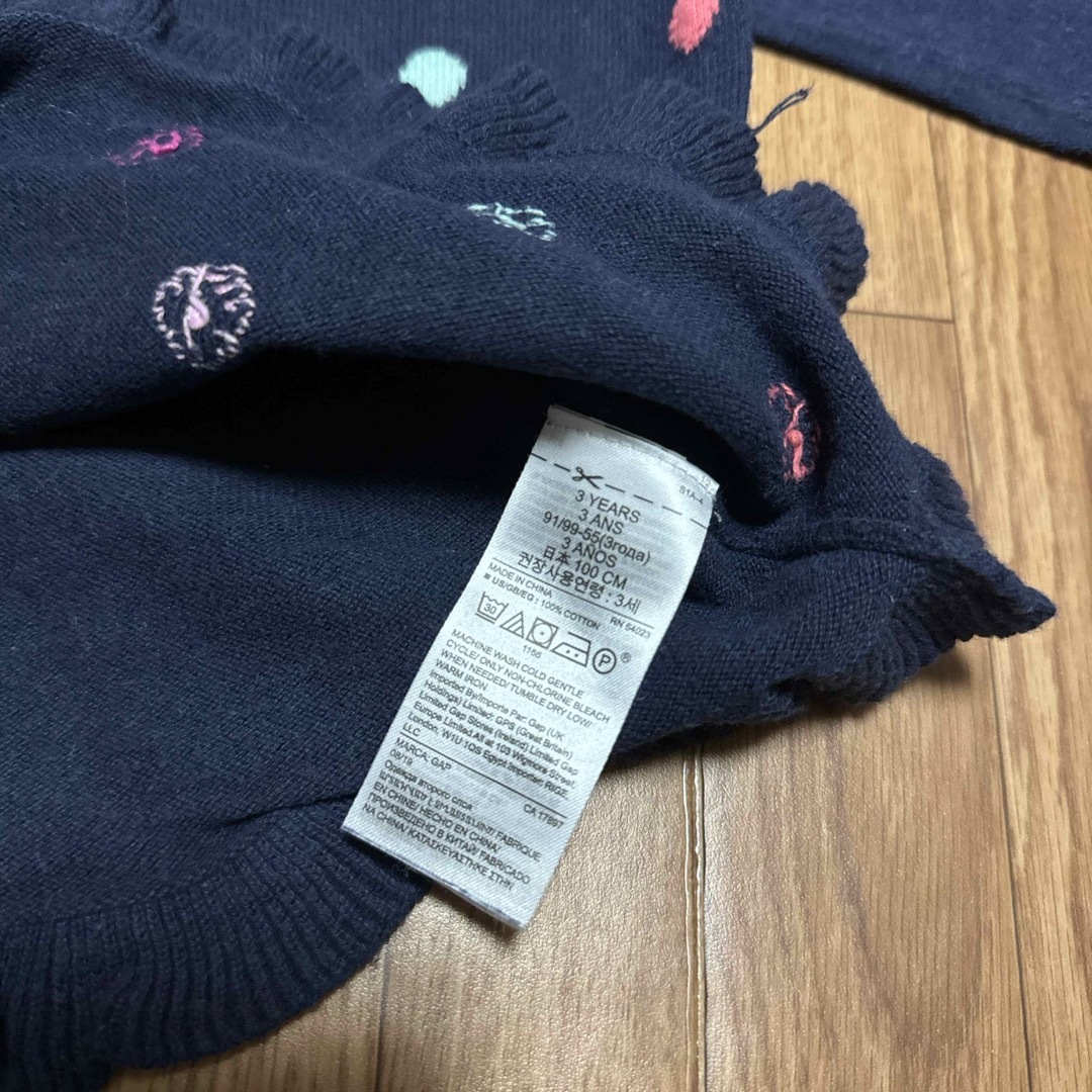 babyGAP(ベビーギャップ)のネイビー　フリルニット キッズ/ベビー/マタニティのキッズ服女の子用(90cm~)(ニット)の商品写真