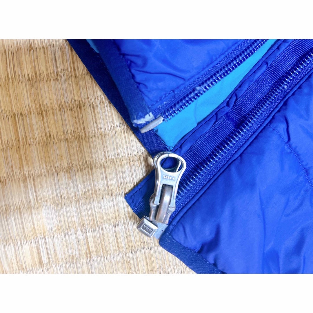 mont bell(モンベル)のmont-bellモンベル リバーシブル中綿ジャケット 130 ブルー キッズ/ベビー/マタニティのキッズ服男の子用(90cm~)(ジャケット/上着)の商品写真