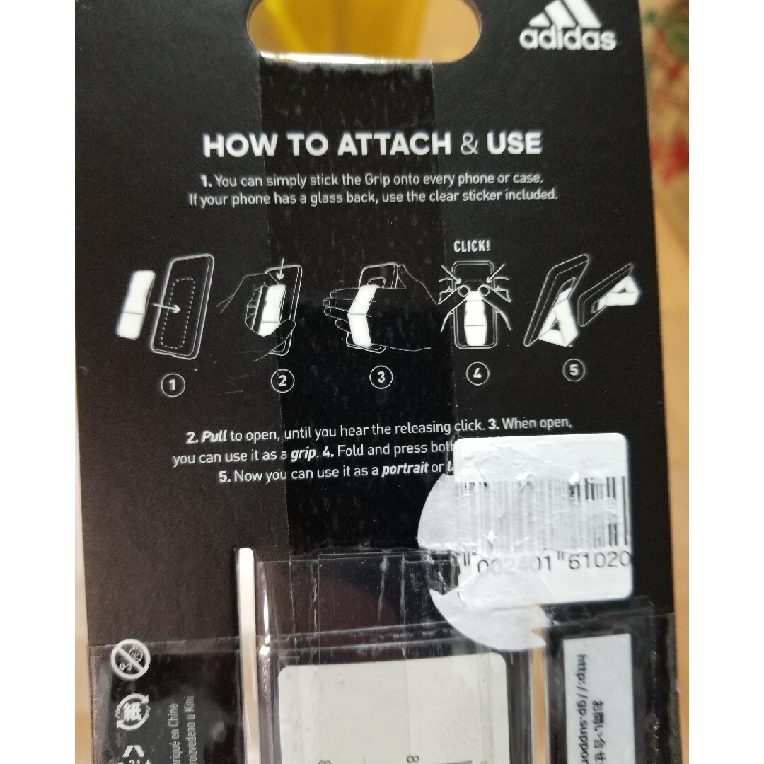 adidas(アディダス)のアディダス　スマホ　グリップスタンド　新品 スマホ/家電/カメラのスマホアクセサリー(その他)の商品写真