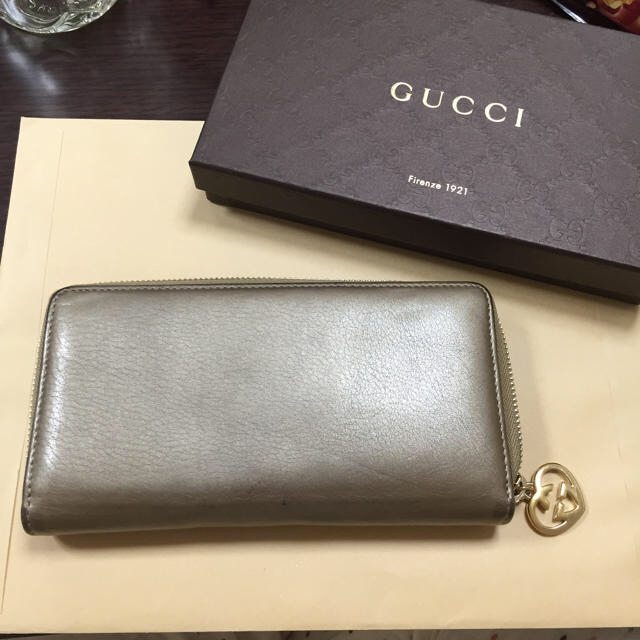 Gucci(グッチ)のGUCCI ゴールド財布 レディースのファッション小物(財布)の商品写真