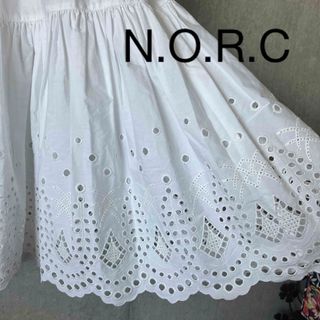 ノーク(N.O.R.C)の白ロングスカート コットンレース(ロングスカート)