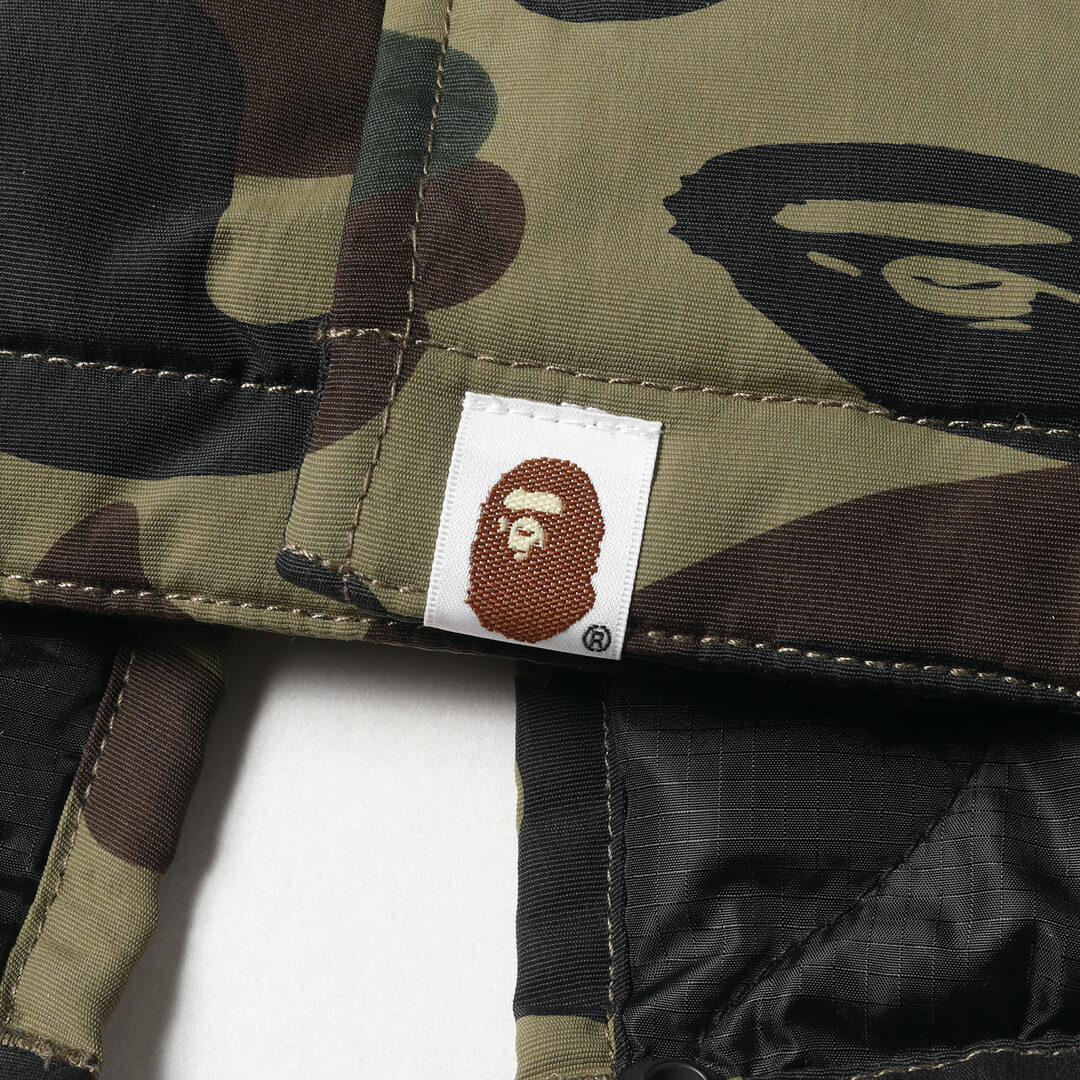 A BATHING APE(アベイシングエイプ)の美品 A BATHING APE ア ベイシング エイプ コート サイズ:WMNS XS 1stカモ 猿迷彩 裏地キルティング フィッシュテール モッズコート グリーンカモ ブラック アウター ジャケット ブルゾン【レディース】【中古】 メンズのジャケット/アウター(ミリタリージャケット)の商品写真