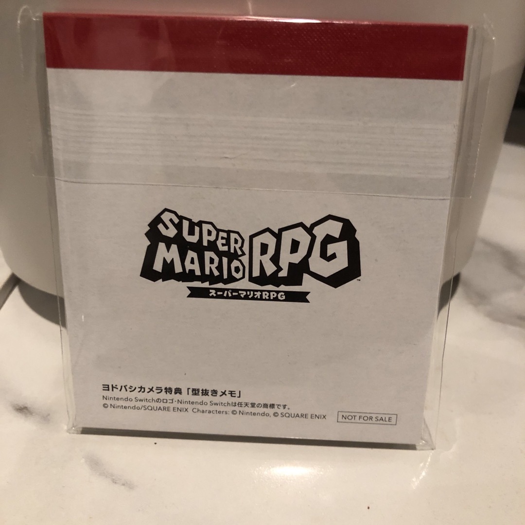 Nintendo Switch(ニンテンドースイッチ)のスーパーマリオRPG 型抜きメモ　ヨドバシカメラ特典 エンタメ/ホビーのおもちゃ/ぬいぐるみ(キャラクターグッズ)の商品写真