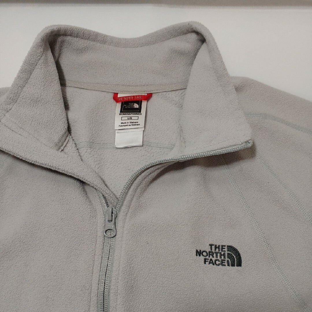 THE NORTH FACE(ザノースフェイス)の76♪US古着 ザ・ノースフェイスフリース ジャケットグレーUS-L(日本L) レディースのジャケット/アウター(ナイロンジャケット)の商品写真