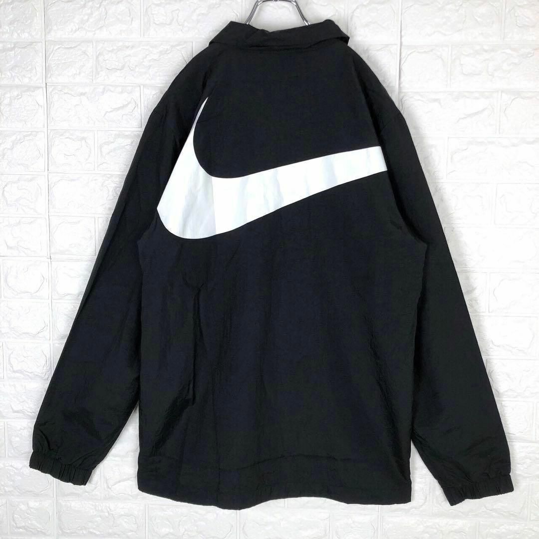 NIKE(ナイキ)のナイキ 定番 コーチジャケット バックデカロゴ 胸ロゴ ナイロンジャケット 黒 メンズのジャケット/アウター(ナイロンジャケット)の商品写真