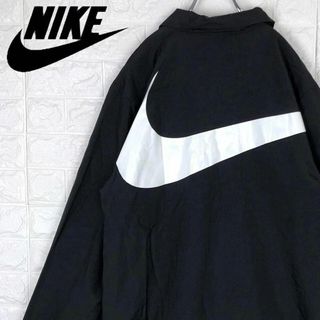 ナイキ(NIKE)のナイキ 定番 コーチジャケット バックデカロゴ 胸ロゴ ナイロンジャケット 黒(ナイロンジャケット)