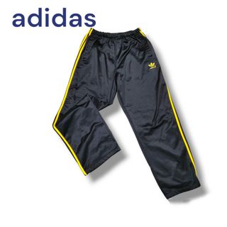 アディダス(adidas)のadidasアディダスジャージ　トラックパンツ　３本ライン　黒×黄色スポーツ(その他)