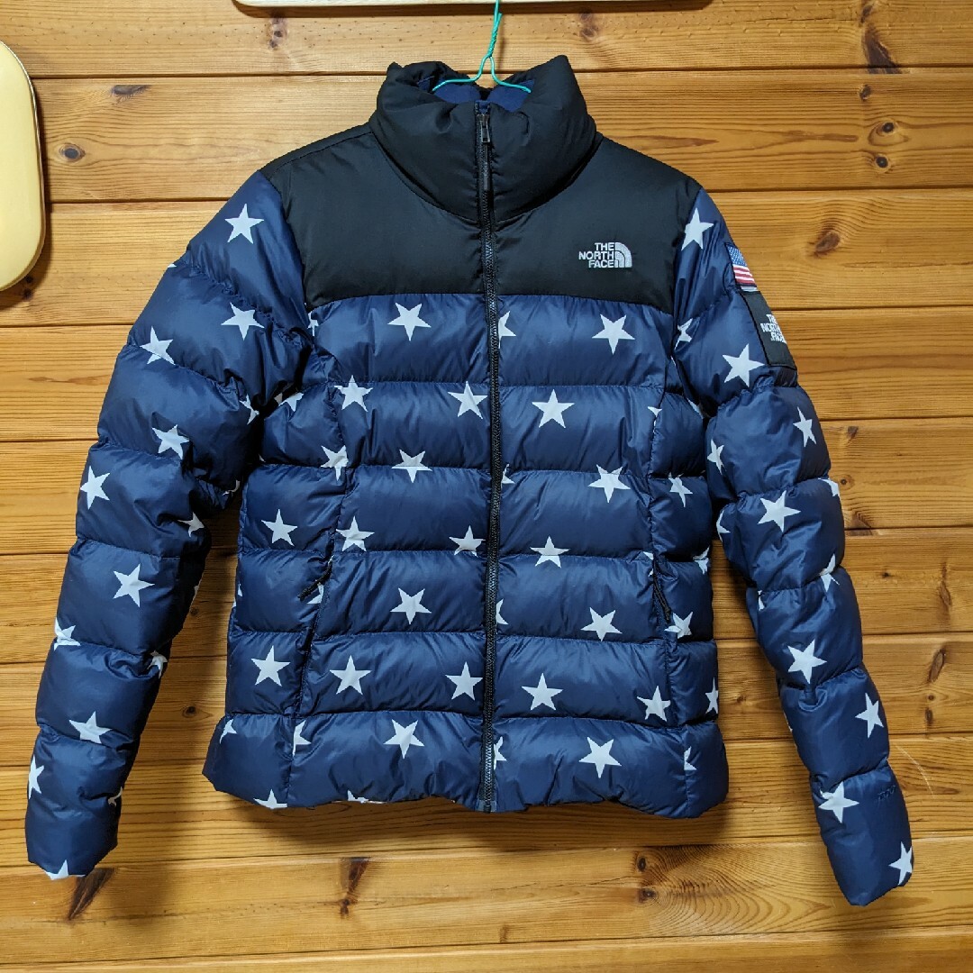 某フリマアプリカラーTHE NORTH FACE ヌプシ ダウンジャケット 星条旗