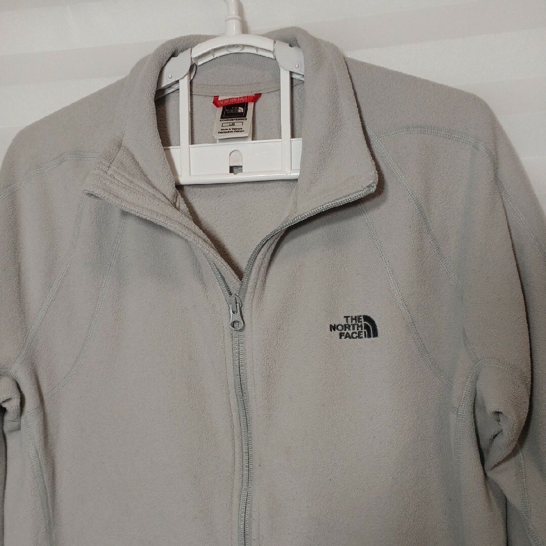 THE NORTH FACE(ザノースフェイス)の76♪US古着 ザ・ノースフェイスフリース ジャケットグレーUS-L(日本L) レディースのジャケット/アウター(ナイロンジャケット)の商品写真