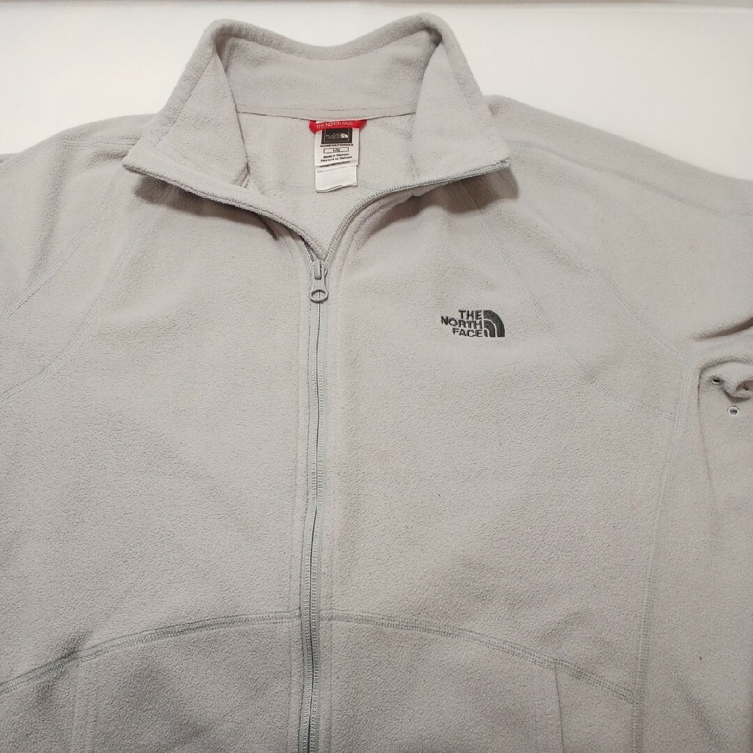 THE NORTH FACE(ザノースフェイス)の76♪US古着 ザ・ノースフェイスフリース ジャケットグレーUS-L(日本L) レディースのジャケット/アウター(ナイロンジャケット)の商品写真