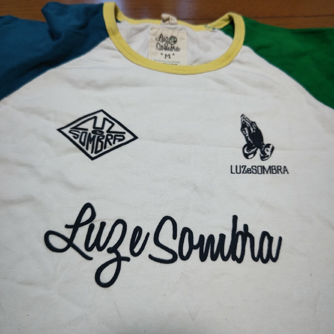 LUZ(ルース)のルースイソンブラ　七分袖？　Tシャツ　Mサイズ スポーツ/アウトドアのサッカー/フットサル(ウェア)の商品写真