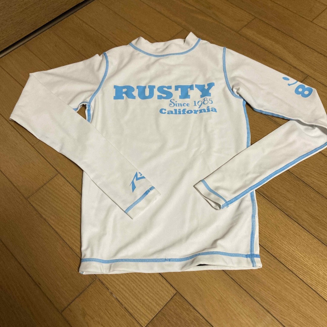 RUSTY(ラスティ)のラッシュガード　7S〜9S スポーツ/アウトドアのスポーツ/アウトドア その他(マリン/スイミング)の商品写真