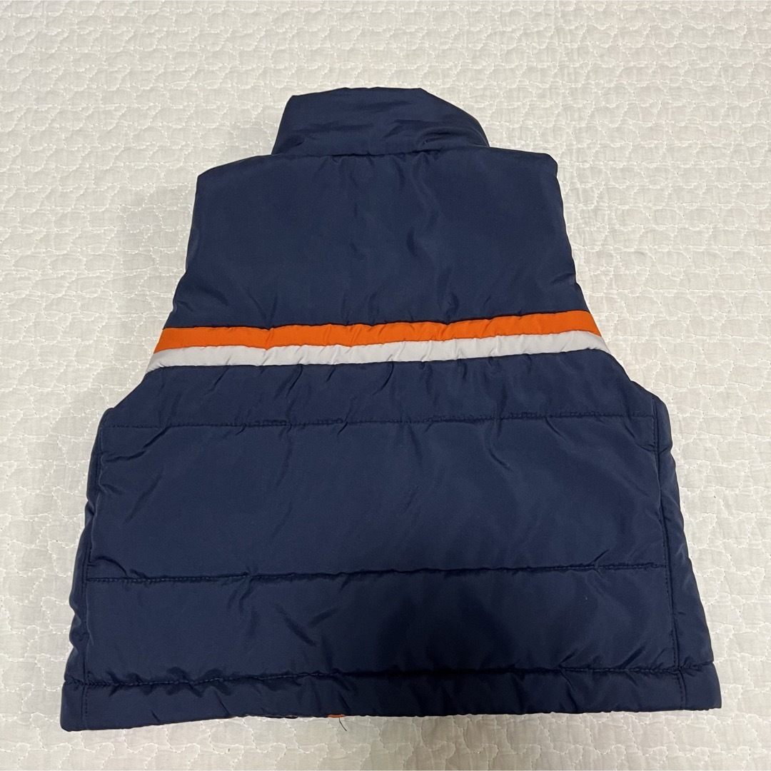 NIKE(ナイキ)のNIKE キッズベスト リバーシブル ネイビー×オレンジ 90cm キッズ/ベビー/マタニティのキッズ服男の子用(90cm~)(ジャケット/上着)の商品写真