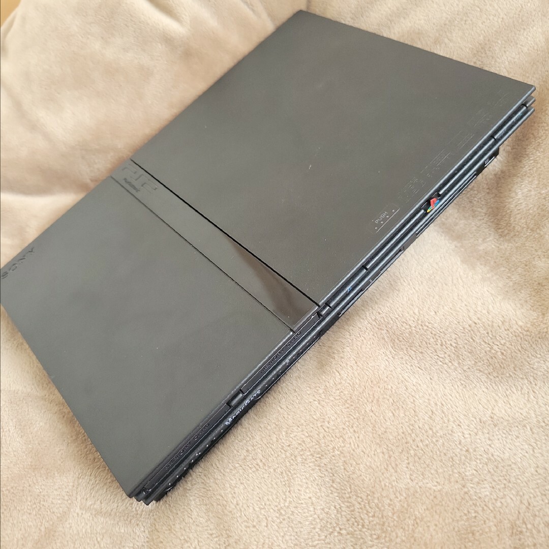 PlayStation2(プレイステーション2)のジャンク プレイステーション2 薄型 SCPH-70000 エンタメ/ホビーのゲームソフト/ゲーム機本体(家庭用ゲーム機本体)の商品写真