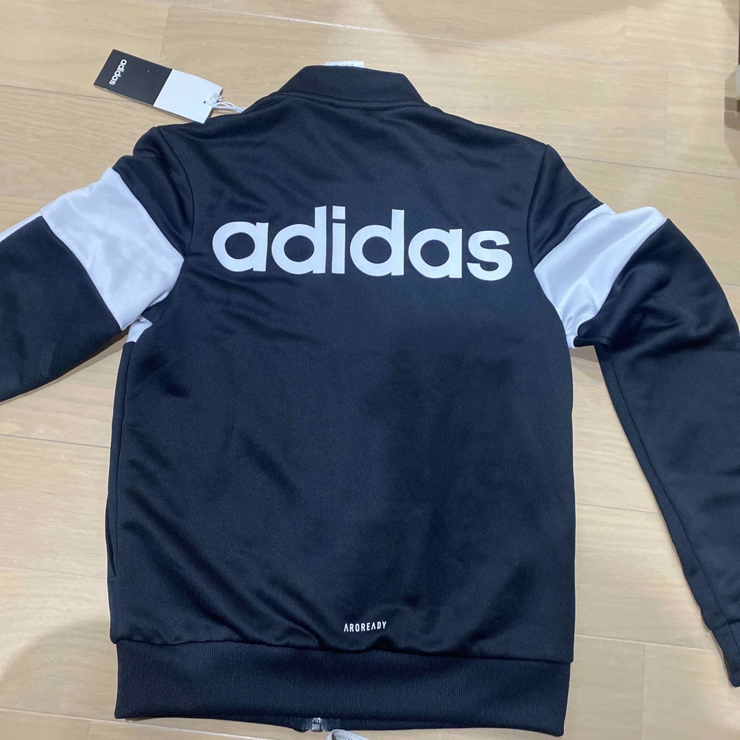 adidas(アディダス)の新品　アディダス　ジャージ　羽織り　黒 キッズ/ベビー/マタニティのキッズ服男の子用(90cm~)(ジャケット/上着)の商品写真