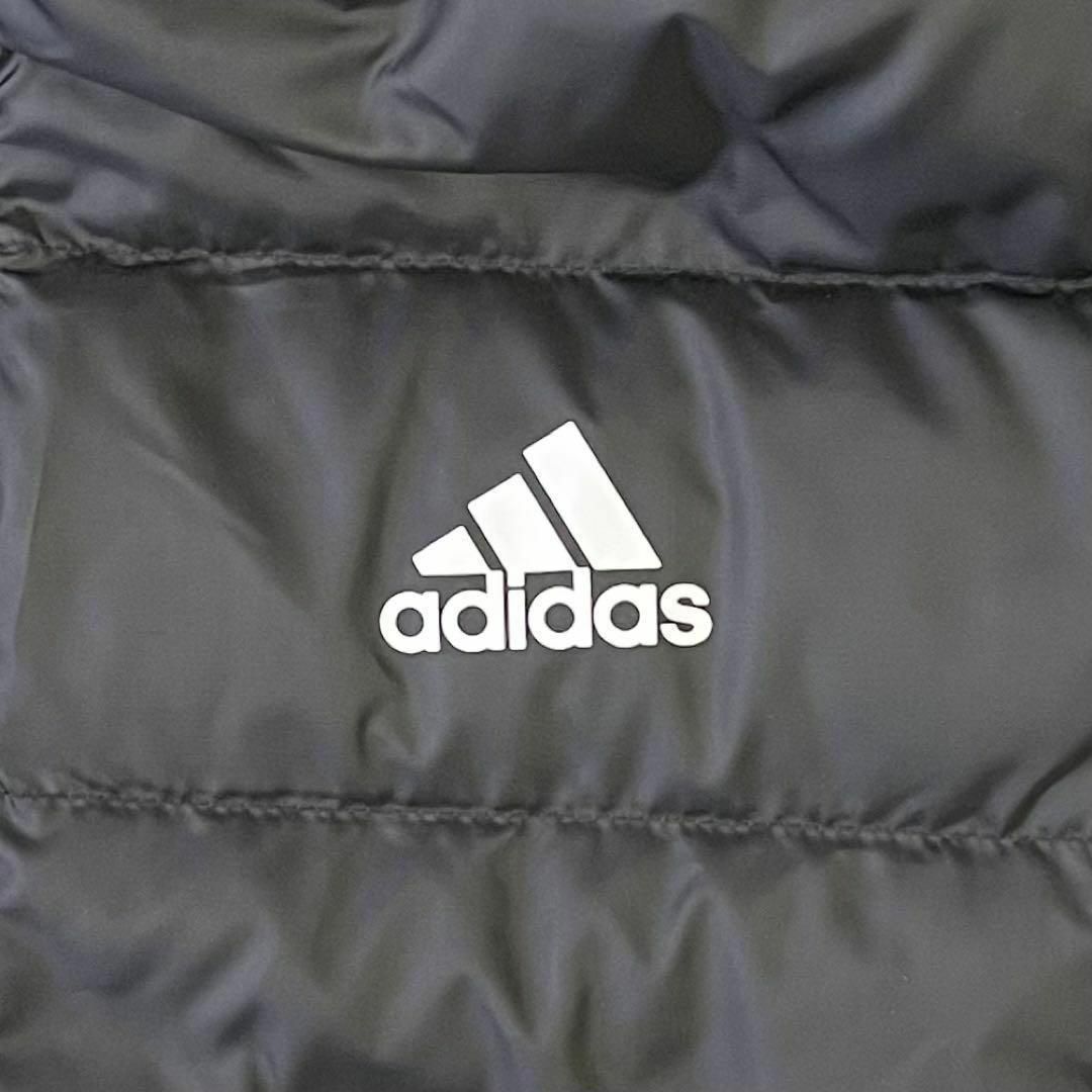 adidas(アディダス)の新品 アディダス Mサイズ 黒色 フードジャケット スリムフィット レディースのジャケット/アウター(ダウンジャケット)の商品写真