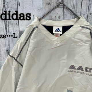 アディダス(adidas)のadidas 人気♪ピステ　クリーム色　Vネック　Ｌ　ナイロンジャケット(パーカー)