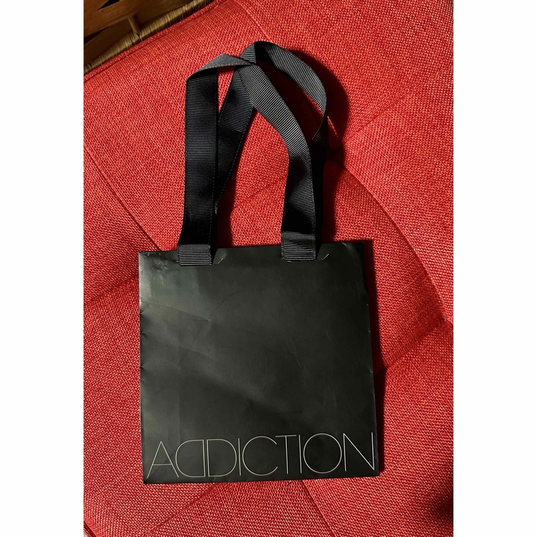 ADDICTIONショップ紙袋 レディースのバッグ(ショップ袋)の商品写真