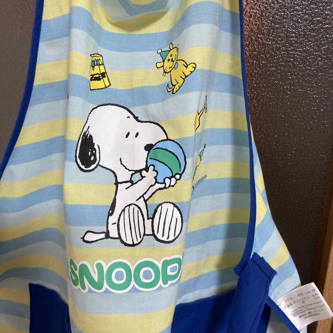 SNOOPY(スヌーピー)のキッズ　スヌーピー  エプロン　130サイズ ハンドメイドのキッズ/ベビー(ファッション雑貨)の商品写真