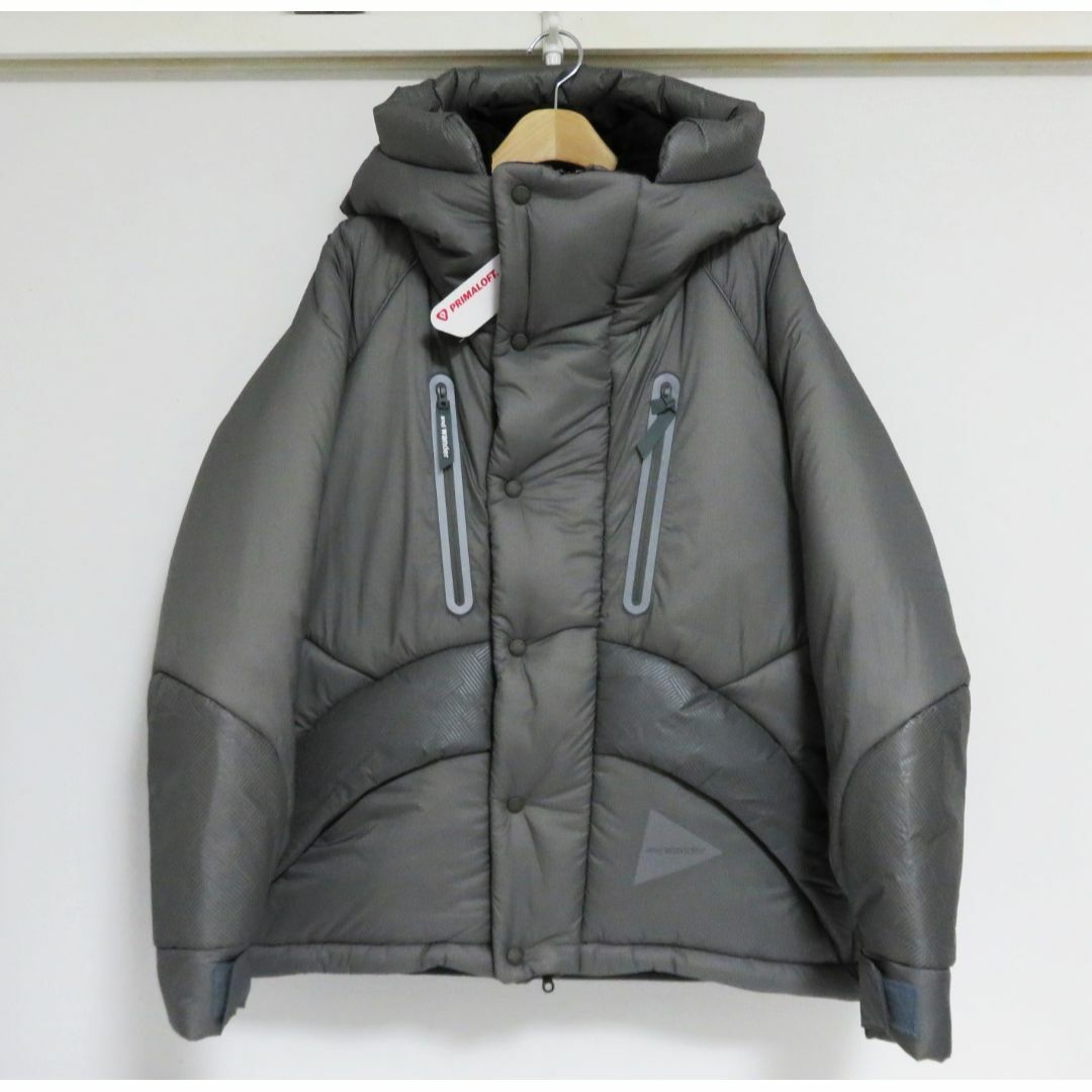 and wander(アンドワンダー)の新品 and wander PRIMALOFT rip jacket S M メンズのジャケット/アウター(ダウンジャケット)の商品写真