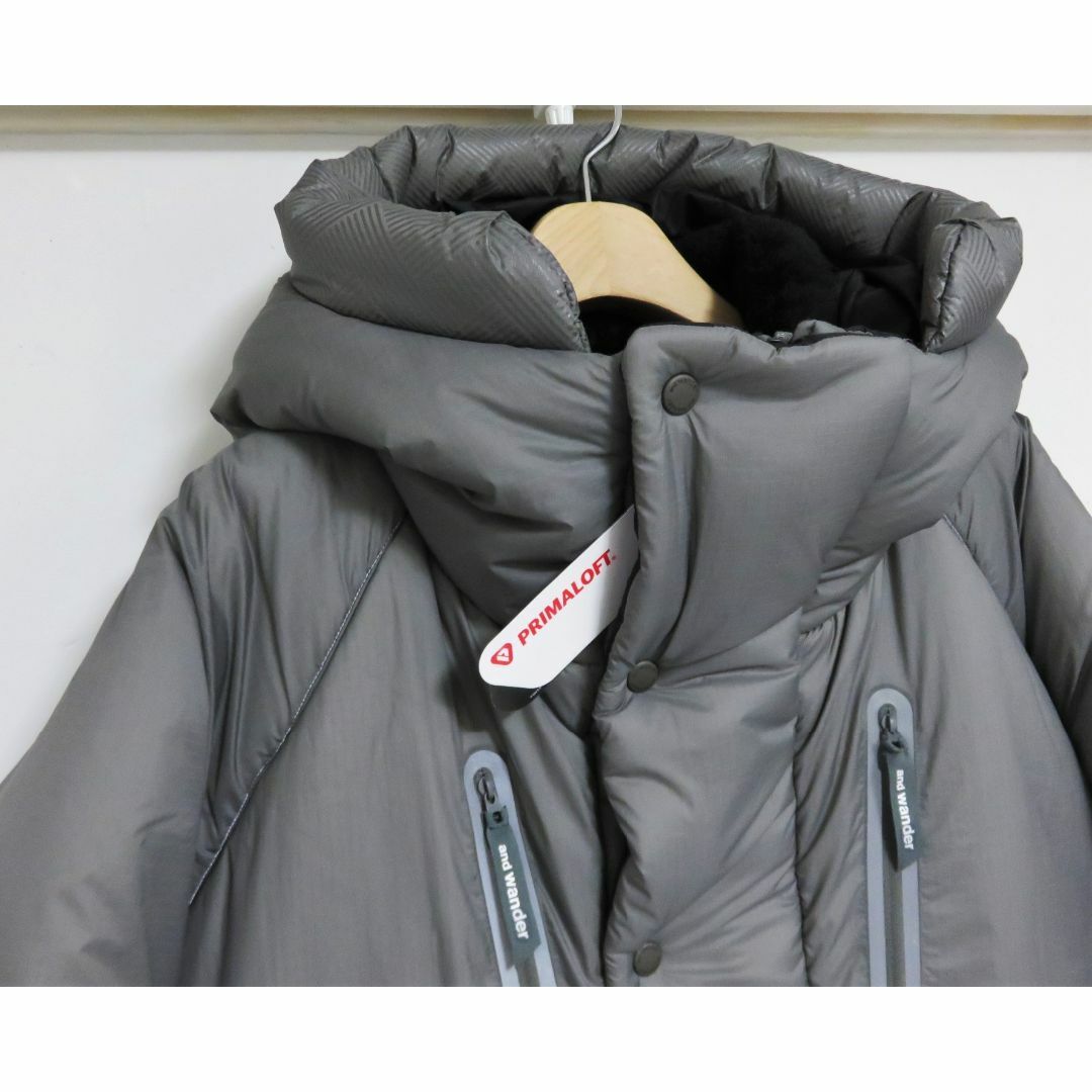 and wander(アンドワンダー)の新品 and wander PRIMALOFT rip jacket S M メンズのジャケット/アウター(ダウンジャケット)の商品写真