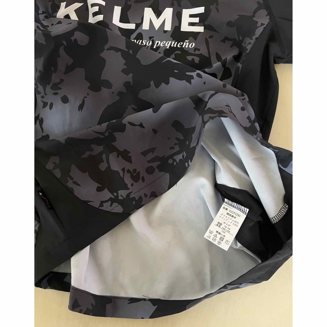 KELME(ケルメ)の新品タグ付き　150cm KELMEケルメ トレーニングピステスーツ ブラック スポーツ/アウトドアのサッカー/フットサル(ウェア)の商品写真