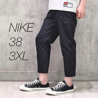 ナイキ(NIKE)の38 3XL 新品 ナイキ ウーブンパンツ スニーカーパンツ 黒 エッセンシャル(その他)