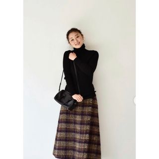 ハグオーワー(Hug O War)のCloth&Cross   Shaggy check fringe skirt (ロングスカート)