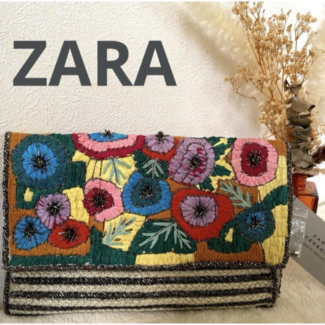 ZARA(ザラ)のZARA 花柄刺繍　ボーダー　ビーズ　クラッチバッグ　 タグ付き新品未使用品 レディースのバッグ(クラッチバッグ)の商品写真