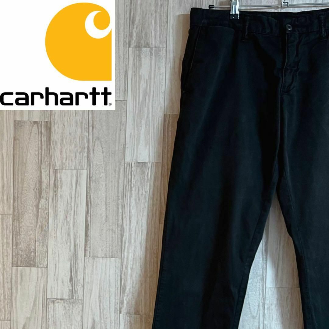 carhartt(カーハート)のカーハートチノパン　34×34 ヴィンテージ　黒　シンプル　ワンポイントロゴ メンズのパンツ(チノパン)の商品写真