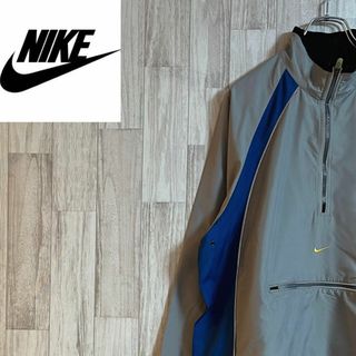 ナイキ(NIKE)のナイキナイロンプルオーバージャケット　裏メッシュ　スポーツウェア　グレー　M(ナイロンジャケット)