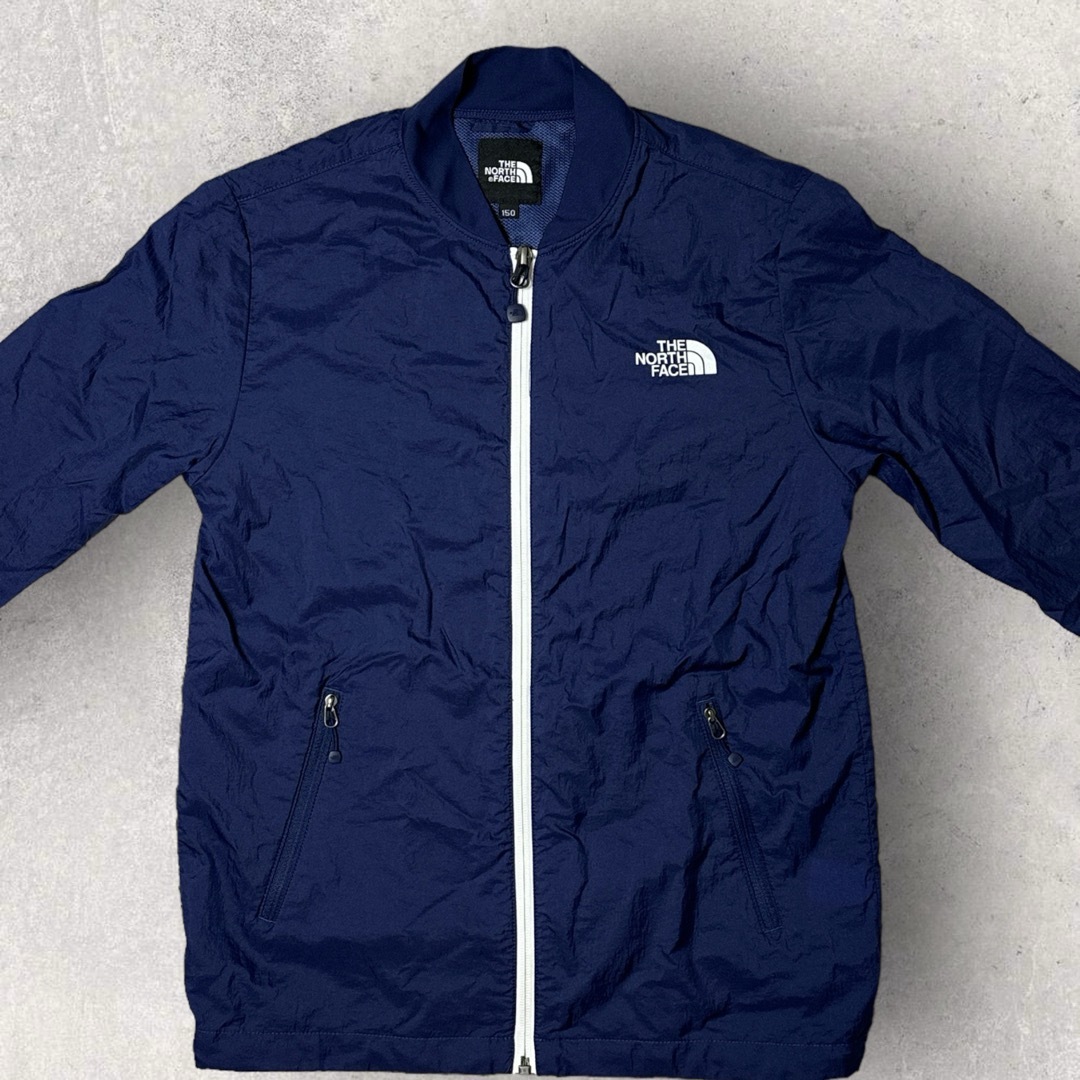 THE NORTH FACE(ザノースフェイス)のノースフェイス　マウンテンジャケット　キッズ　150 ブルー キッズ/ベビー/マタニティのキッズ服女の子用(90cm~)(ジャケット/上着)の商品写真