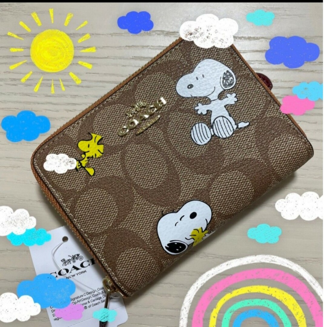 レディース新品　COACH　二つ折り財布　スヌーピー　ディズニー　シグネチャー　小銭入れ有