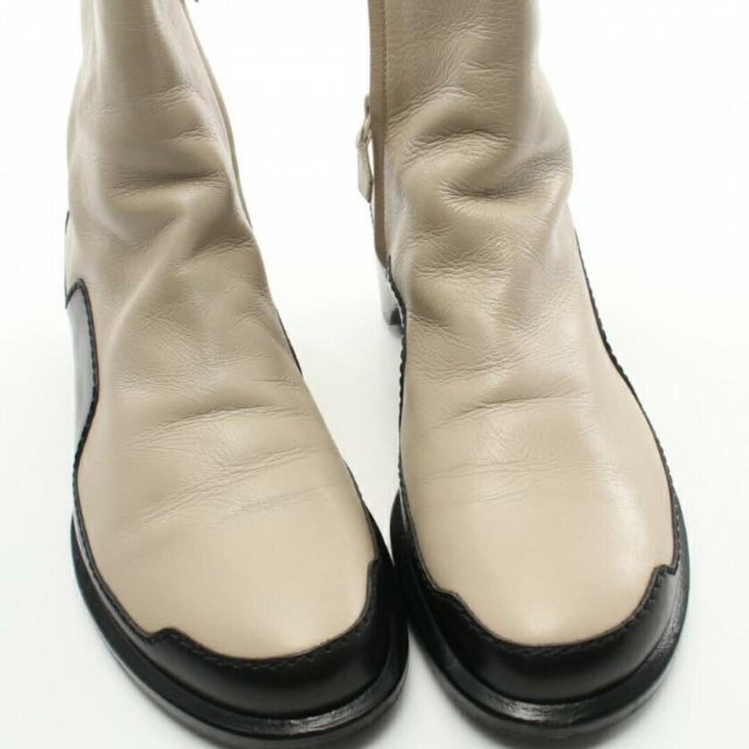 Hermes(エルメス)の ショート ブーツ レザー ライトベージュ ブラック バイカラー レディースの靴/シューズ(ブーツ)の商品写真