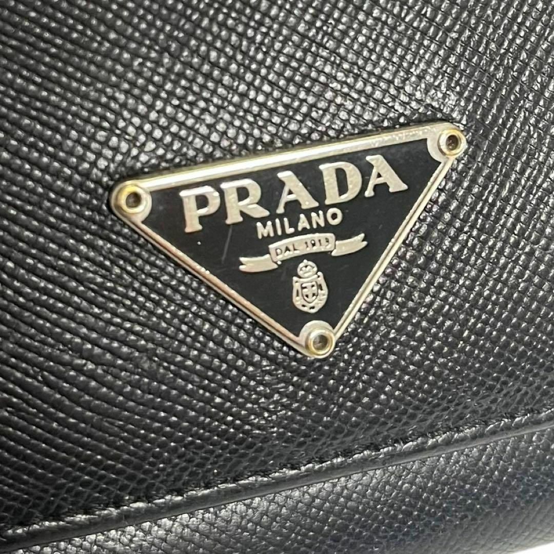 PRADA(プラダ)の【美品】プラダ　長財布　黒　ブラック　レザー　折財布　小銭　コイン　カード　お札 メンズのファッション小物(長財布)の商品写真