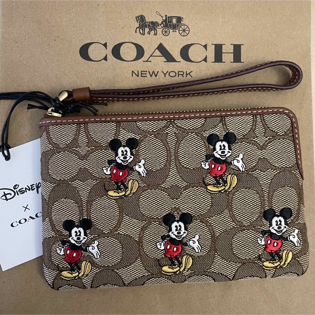 Disney x COACH 新品 ミッキー リストレット・ポーチ・スマホ入れ | フリマアプリ ラクマ