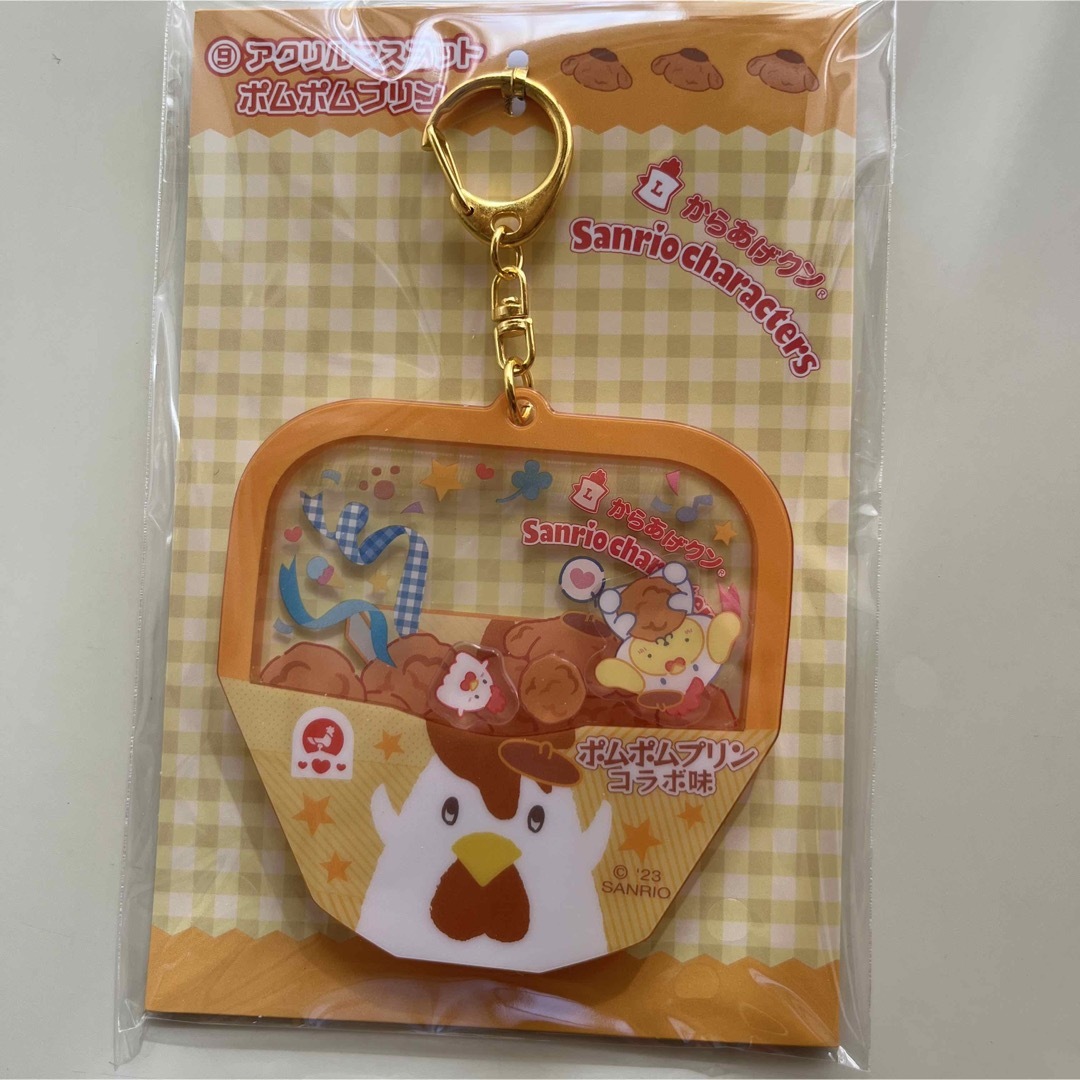 サンリオ(サンリオ)のローソン❤️からあげくん×ポムポムプリン❤︎アクリルキーホルダー　非売品 エンタメ/ホビーのおもちゃ/ぬいぐるみ(キャラクターグッズ)の商品写真