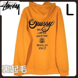 ステューシー(STUSSY)のステューシー WORLD TOUR PULL OVERフーディパーカーオレンジL(パーカー)