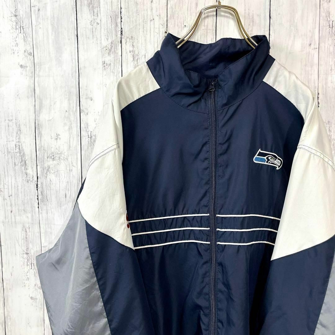 Reebok(リーボック)のNFLアメフト　シーホークス　オーバーサイズ2ＸＬ　薄手ナイロンブルゾン　古着 メンズのジャケット/アウター(ナイロンジャケット)の商品写真