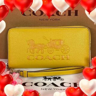 コーチ(COACH) 財布(レディース)（イエロー/黄色系）の通販 300点以上