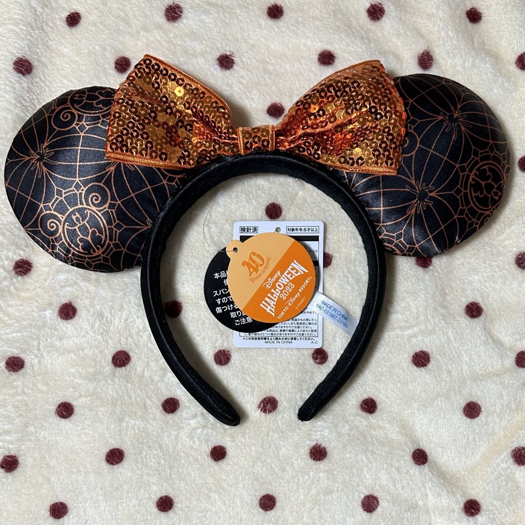 ディズニー ハロウィン 2022 カチューシャ オレンジ レディースのヘアアクセサリー(カチューシャ)の商品写真