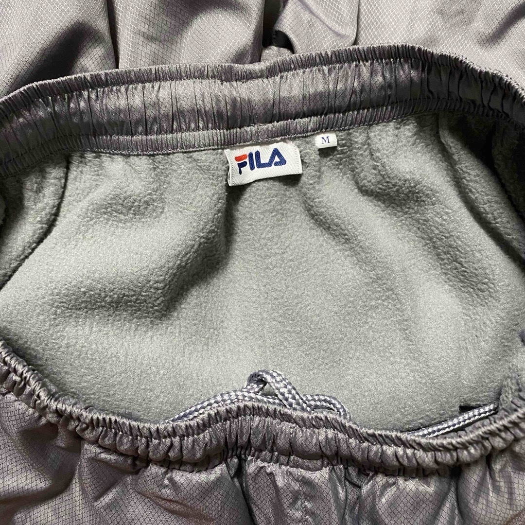 FILA(フィラ)のFILA 裏起毛ウインドブレーカーと裏起毛黒のレギンス レディースのジャケット/アウター(ナイロンジャケット)の商品写真