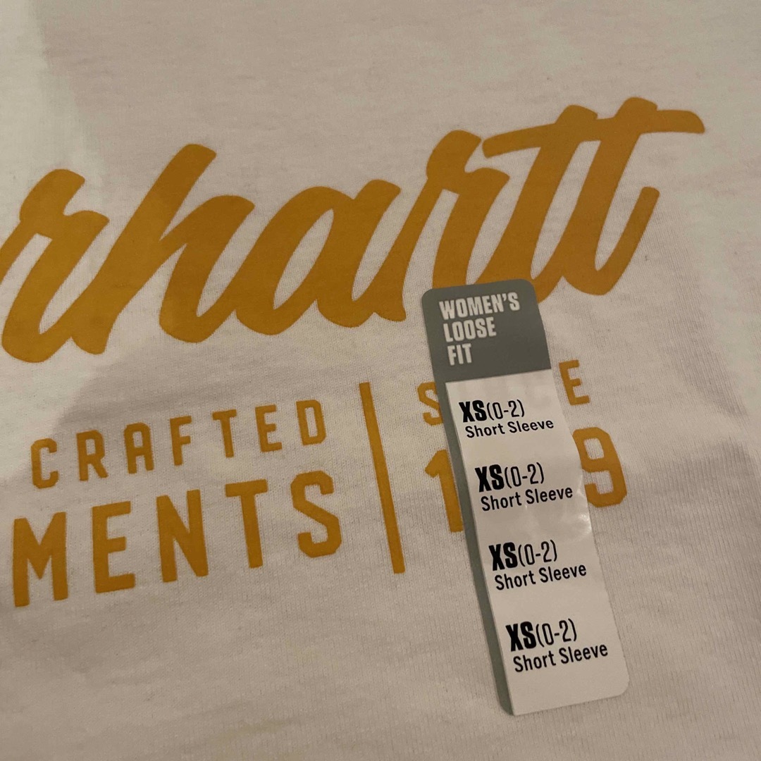 carhartt(カーハート)のcarhartt アメリカ購入　tシャツ  レディースのトップス(Tシャツ(半袖/袖なし))の商品写真